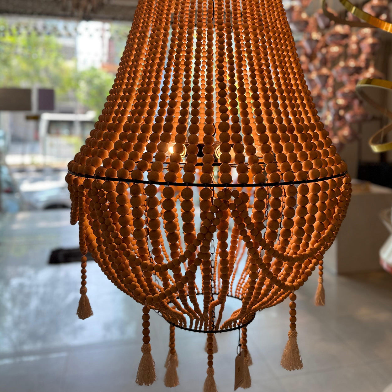 ANKUR BOHEMIAN DOUBLE HEIGHT WOOD AND METAL SPIRITUAL CHANDELIER