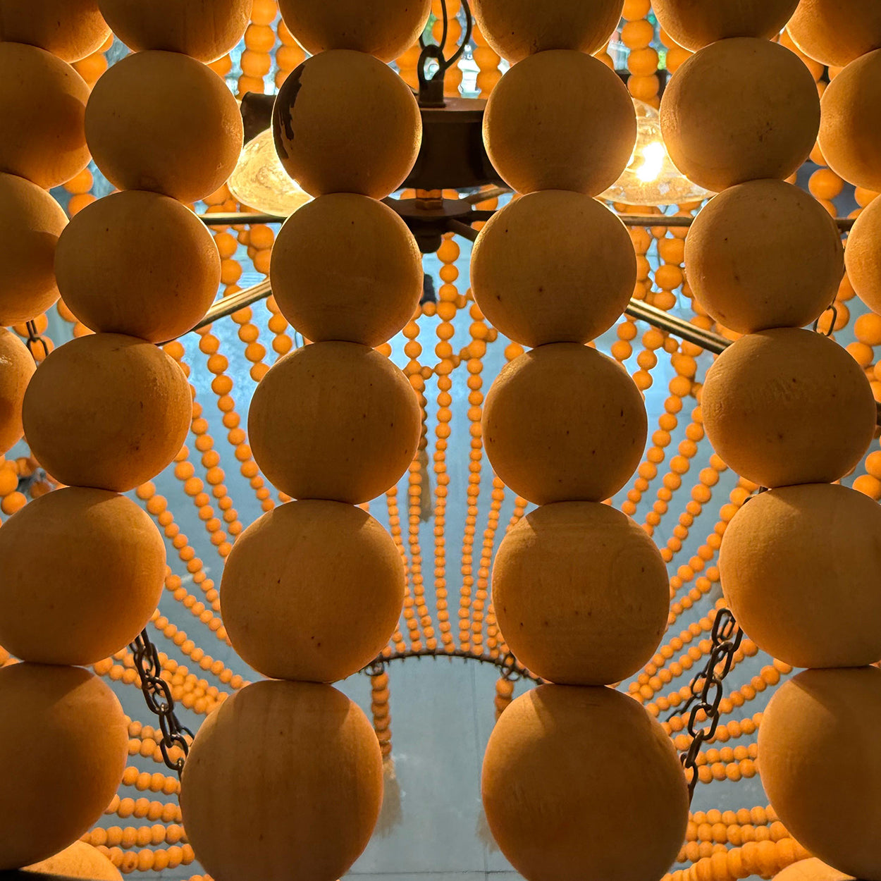 ANKUR BOHEMIAN DOUBLE HEIGHT WOOD AND METAL SPIRITUAL CHANDELIER