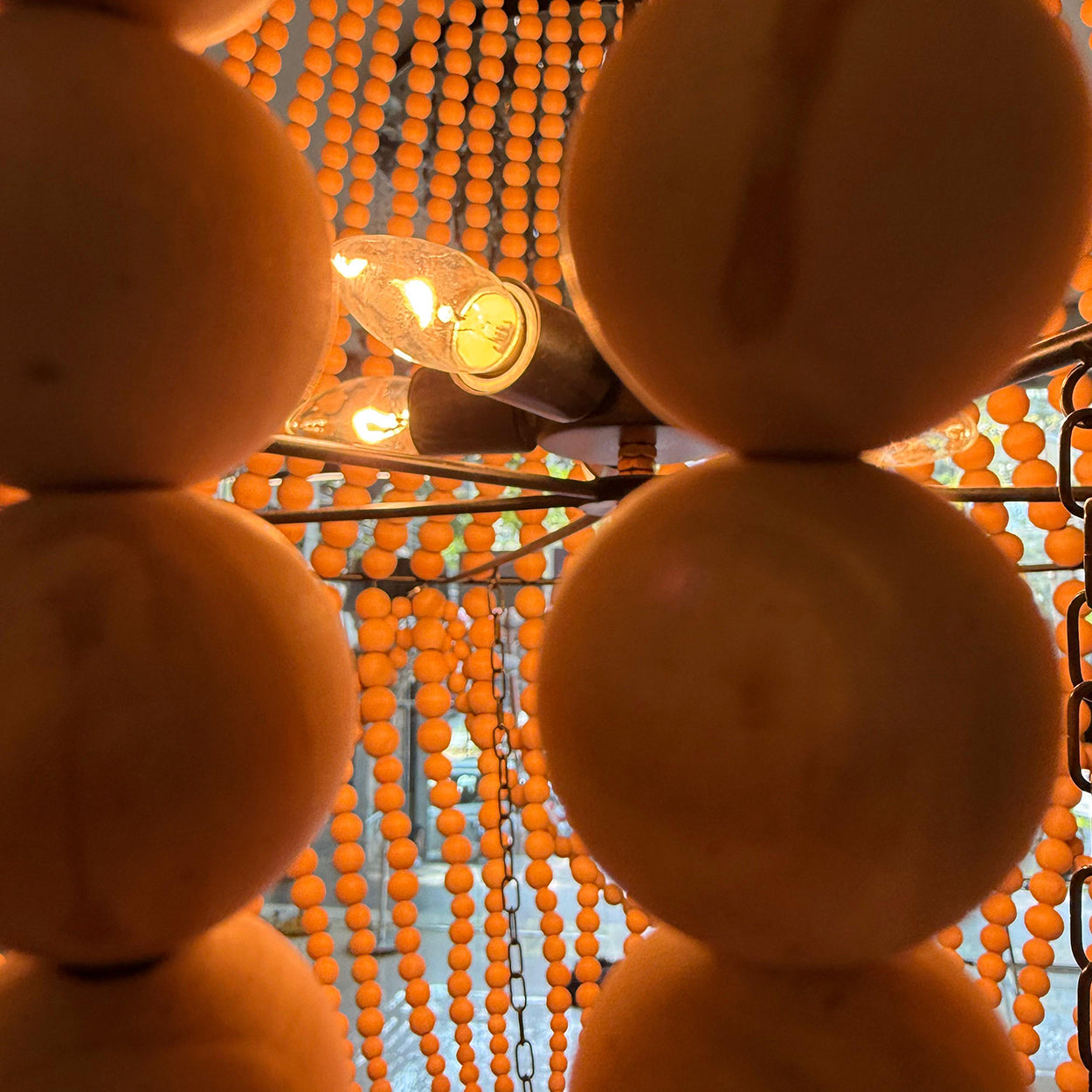 ANKUR BOHEMIAN DOUBLE HEIGHT WOOD AND METAL SPIRITUAL CHANDELIER