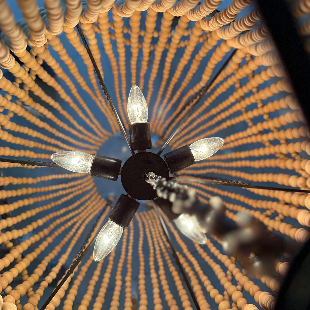 ANKUR BOHEMIAN DOUBLE HEIGHT WOOD AND METAL SPIRITUAL CHANDELIER