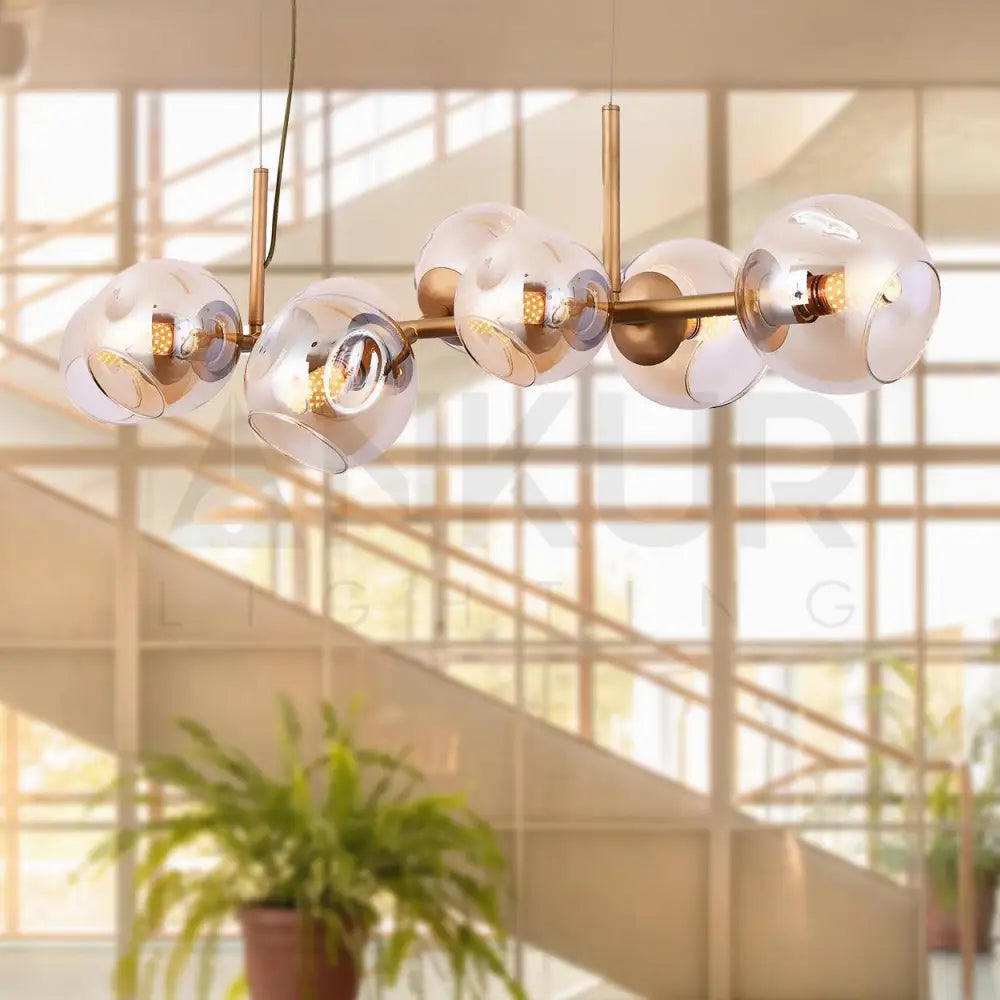 ANKUR JONAS 8 LIGHT CHAMPAGNE GLASS WITH GOLDEN LINEAR CHANDELIER - Ankur Lighting