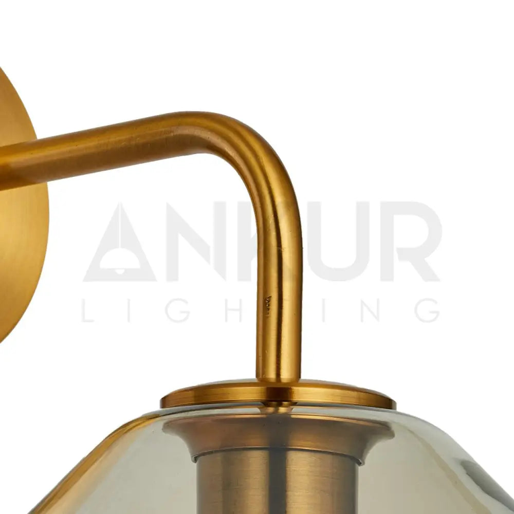 ANKUR PEAR WALL LIGHT WITH AMBER/COGNAC GLASS AND ANTIQUE BRASS FINISH - Ankur Lighting