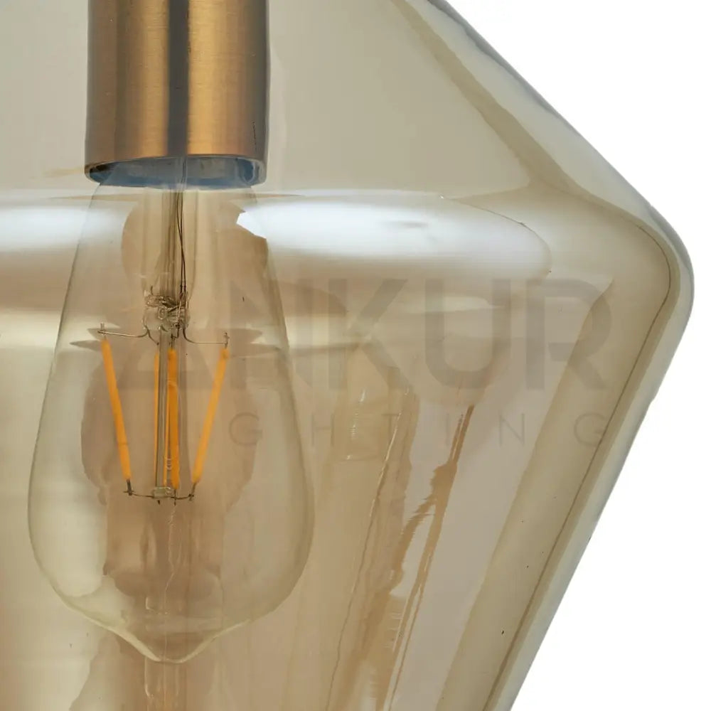 ANKUR PEAR WALL LIGHT WITH AMBER/COGNAC GLASS AND ANTIQUE BRASS FINISH - Ankur Lighting