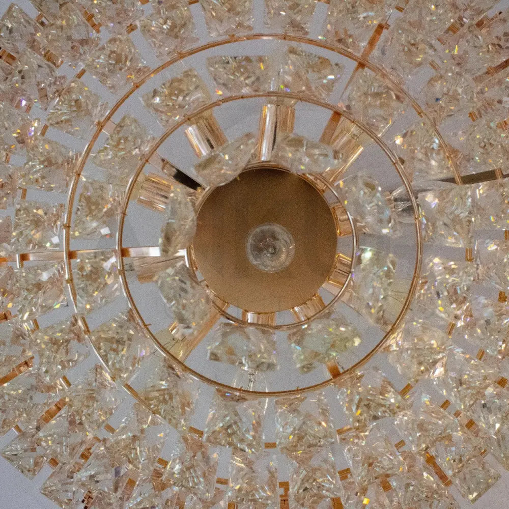 ANKUR ROUND CRYSTAL CHANDELIER WITH GOLD METAL PLATE - Ankur Lighting