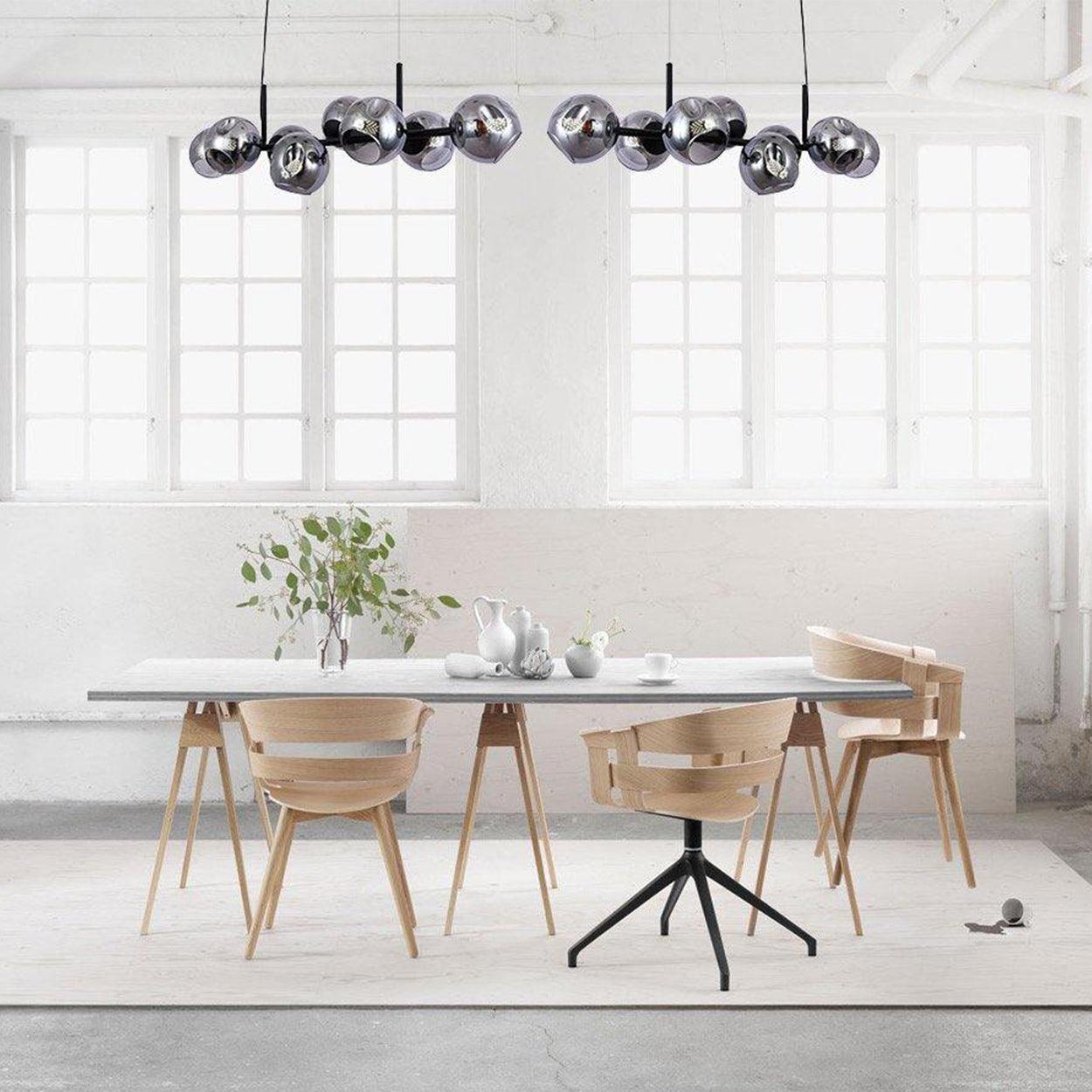 ANKUR JONUS 8 LIGHT SMOKE GREY WITH BLACK METAL LINEAR CHANDELIER - Ankur Lighting