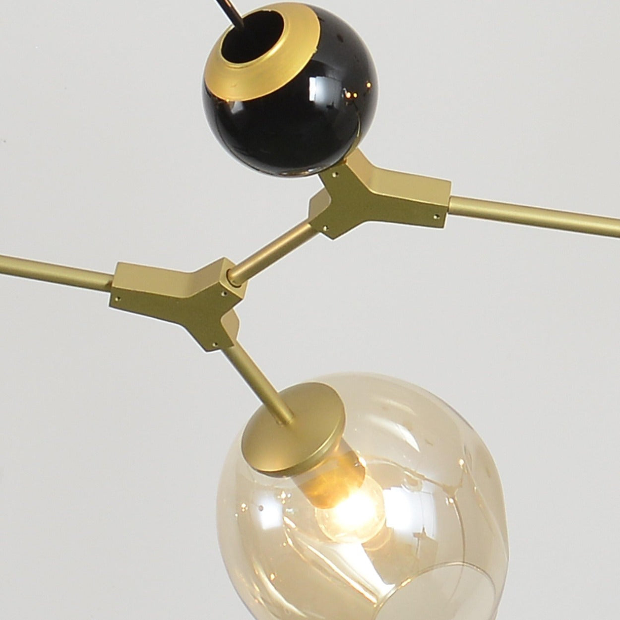 ANKUR BURST 6 LIGHT MODERN CONTEMPORARY GOLDEN CHANDELIER WITH AMBER/CHAMPAGNE GLASSES - Ankur Lighting