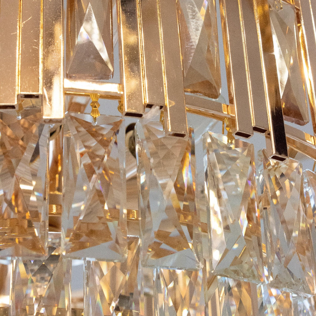 ANKUR ROUND CRYSTAL CHANDELIER WITH GOLD METAL PLATE - Ankur Lighting